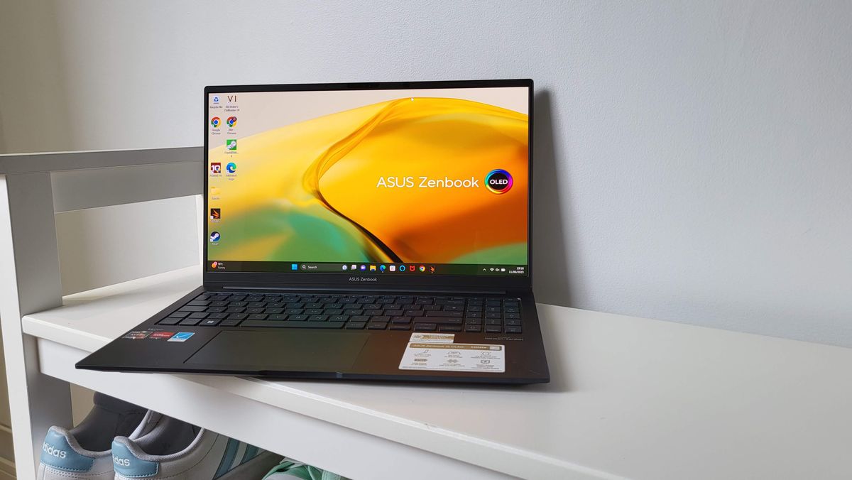 Asus Zenbook 15 OLED (2023) on a shelf