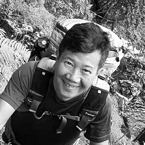 Black and white portrait of Daniel Cheong