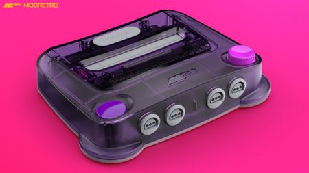 A shot of the ModRetro M64 with a purple cover on a pink background