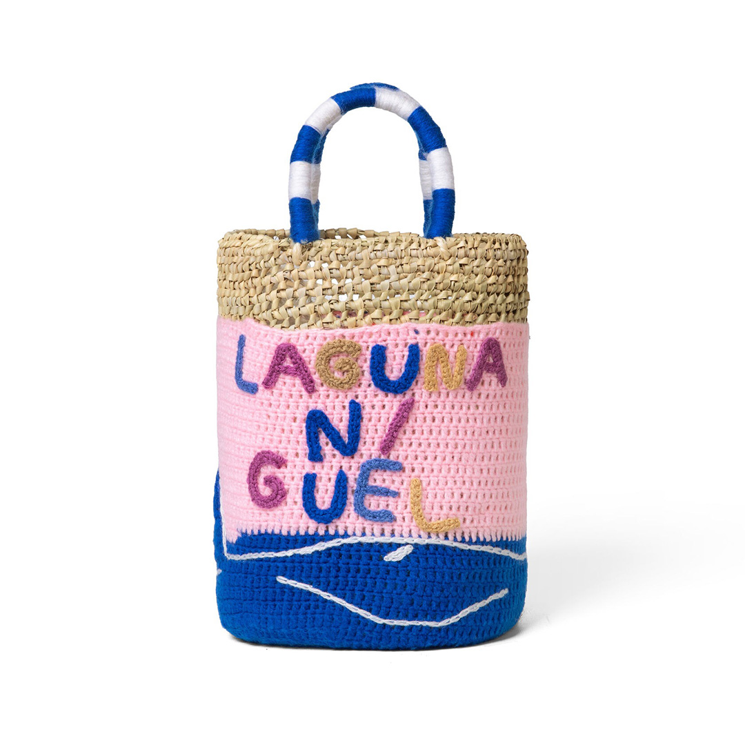 hand-woven bag that says Laguna Niguel.
