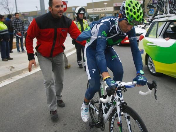 Alejandro Valverde (Movistar) remounting after a crash which occurred soon after exiting the day's second feed zone.