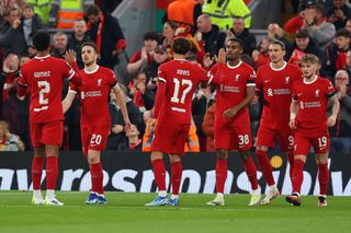 Liverpool players celebrate their opening goal during the UEFA Europa League 2023/24 match between Liverpool FC and Toulouse FC at Anfield on October 26, 2023 in Liverpool, England. (Photo by Ryan Crockett/DeFodi Images via Getty Images)