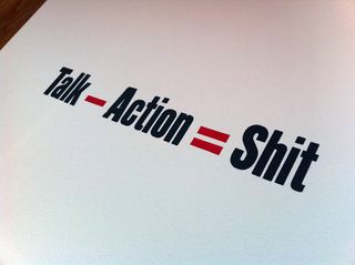 Typography poster reading: “Talk minus action equals shit”