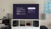 A photo of the Sony Bravia 8 II TV standing on a white bookcase in a living room