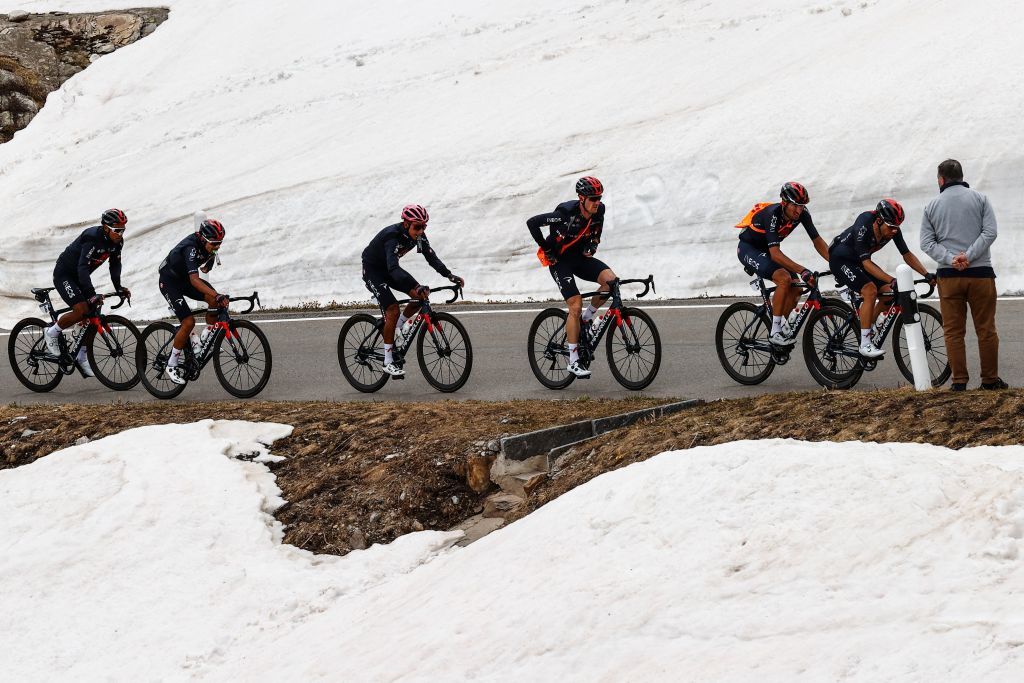 Overall leader Team Ineos rider Colombias Egan Bernal 3rdL and his teammates ride across the San Bernardino pass Switzerland during the 20th stage of the Giro dItalia 2021 cycling race 164km between Verbania and Valle Spluga Alpe Motta Madesimo on May 29 2021 Photo by Luca Bettini AFP Photo by LUCA BETTINIAFP via Getty Images