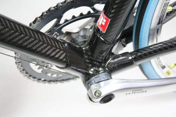 The main tubes join at a huge carbon fibre lug for stiffness at the frame's biggest stress point