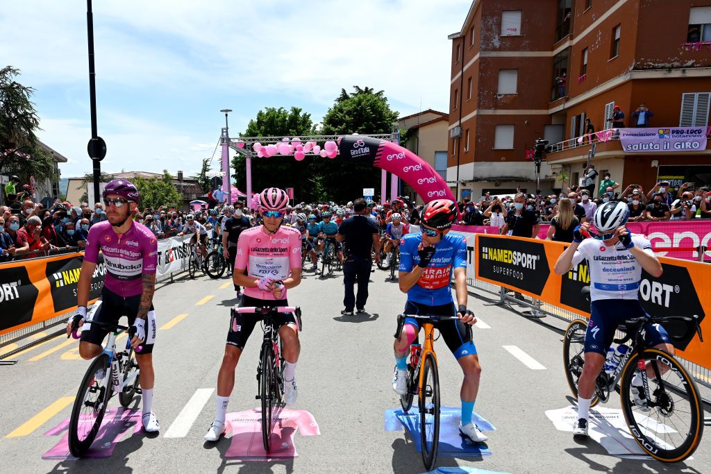 TERMOLI ITALY MAY 14 Giacomo Nizzolo of Italy and Team Qhubeka Assos Purple Points Jersey Attila Valter of Hungary and Team Groupama FDJ Pink Leader Jersey Gino Mader of Switzerland and Team Bahrain Victorious Team Blue Mountain Jersey Remco Evenepoel of Belgium and Team Deceuninck QuickStepWhite Best Young Rider Jersey at start during the 104th Giro dItalia 2021 Stage 7 a 181km stage from Notaresco to Termoli girodiitalia Giro on May 14 2021 in Termoli Italy Photo by Stuart FranklinGetty Images