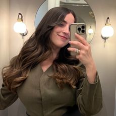 An image of SEO writer Ava Gilchrist with the Bardot Fringe hair trend.