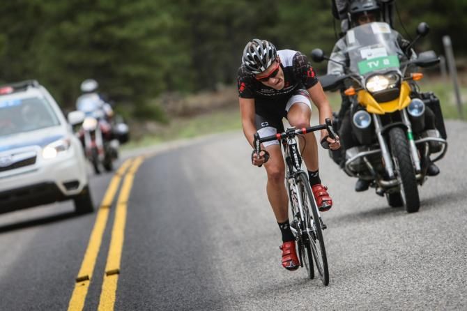 Andsz Flaksis (Bontrager) goes solo over the final KOM