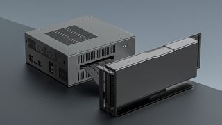 Official render of the ASRock DeskMate X600 connected via PCIe 4.0 x16 riser cable to a full eGPU.