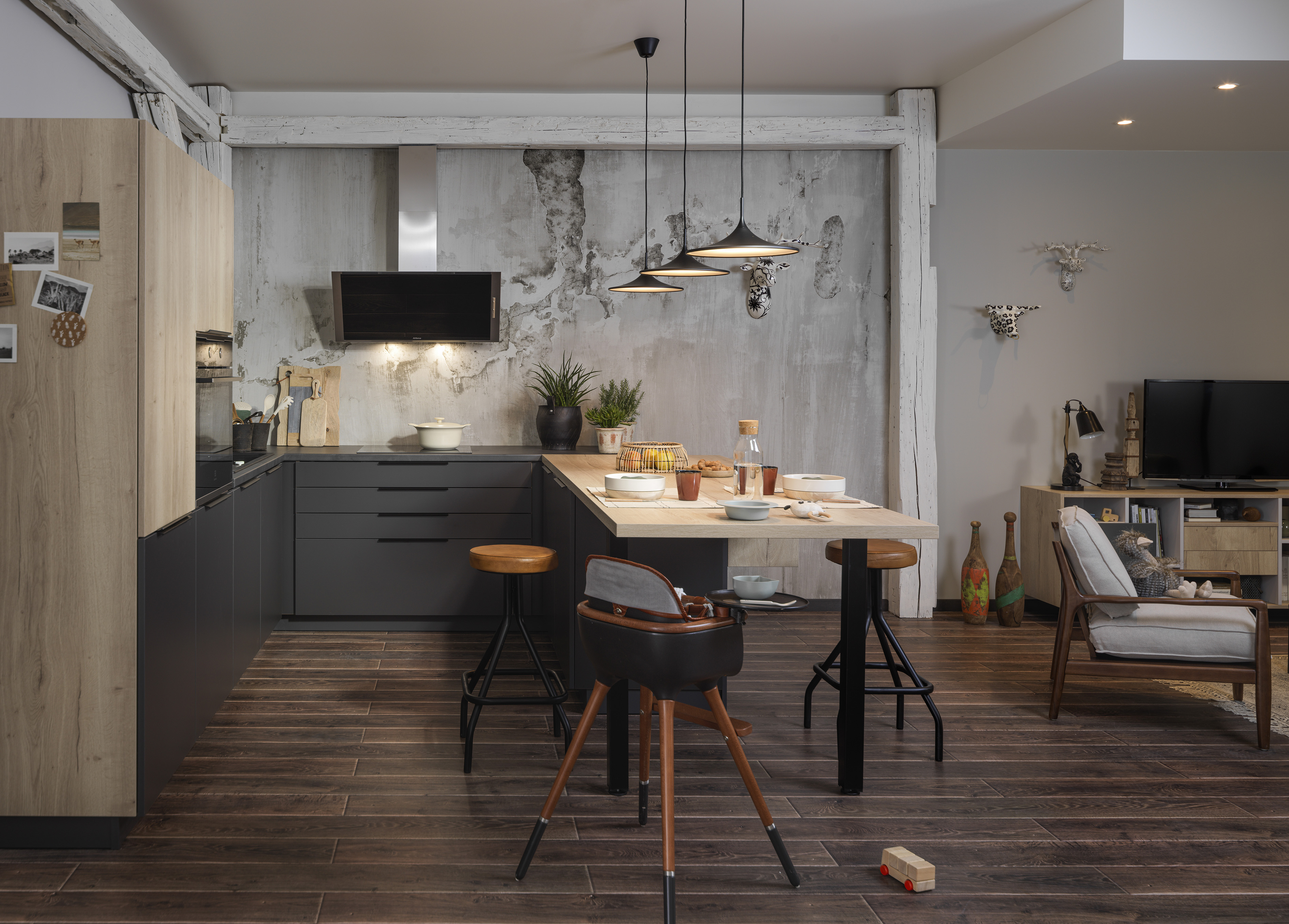 a modern open plan kitchen with a breakfast bar