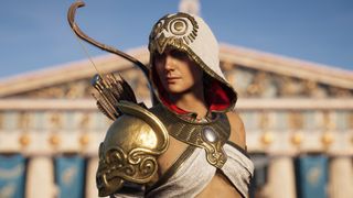 Kassandra standing in front of an Ancient Greek temple in Assassin's Creed Odyssey