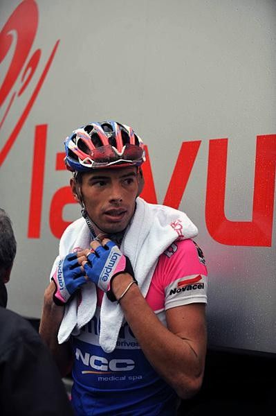 Italy's Alessandro Ballan (Lampre) gets some warmth after a hard stage.