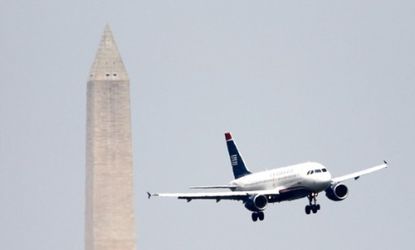 A US Airways plane makes its final approach into Reagan airport in Washington, D.C.