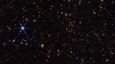 A deep field image from JWST showing stars and galaxies