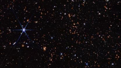 A deep field image from JWST showing stars and galaxies