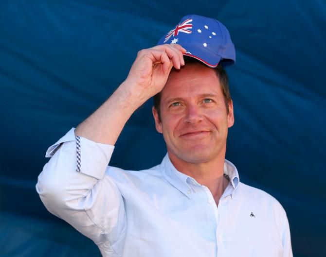 Tour de France race organiser Christian Prudhomme puts on his Australian hat