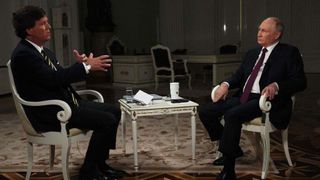 Tucker Carson interviews Russian president Vladimir Putin at the Kremlin.