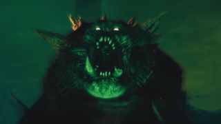 A mutated Chaos troll with a broken tusk roars