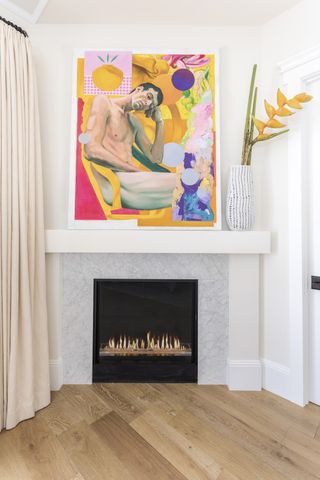 A cream living room with a bold artwork