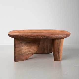 Sculptural wooden coffee table.
