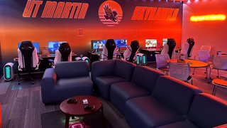 UT Martin's esports lounge alit in orange.
