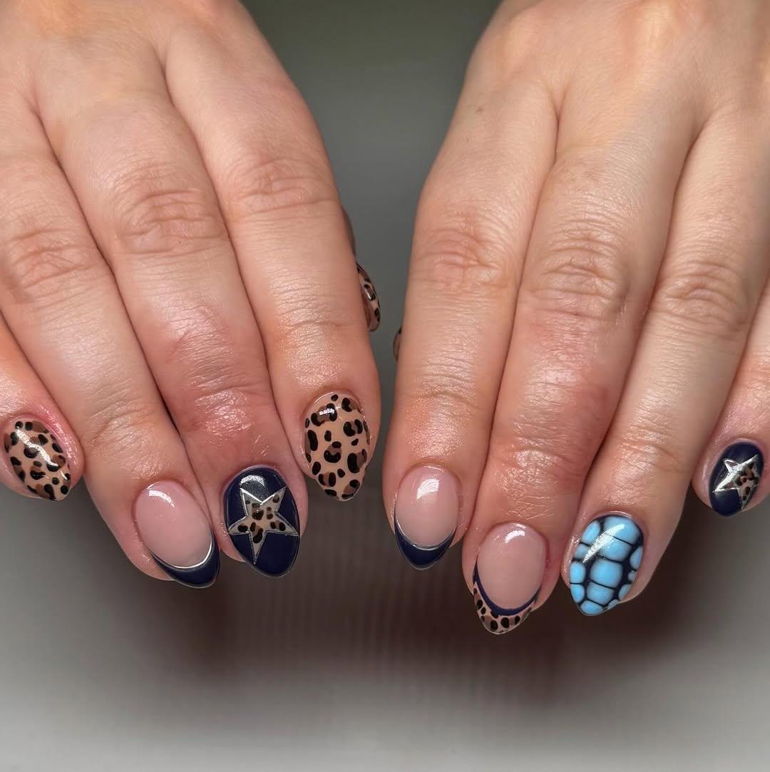leopard nails with star and blue dot designs