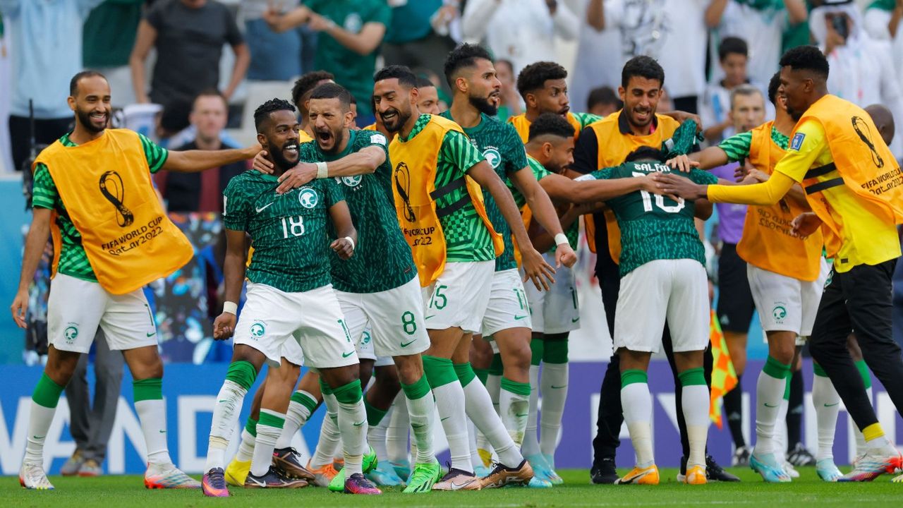 Saudi Arabia players celebrate Salem Al-Dawsari’s winner against Argentina 