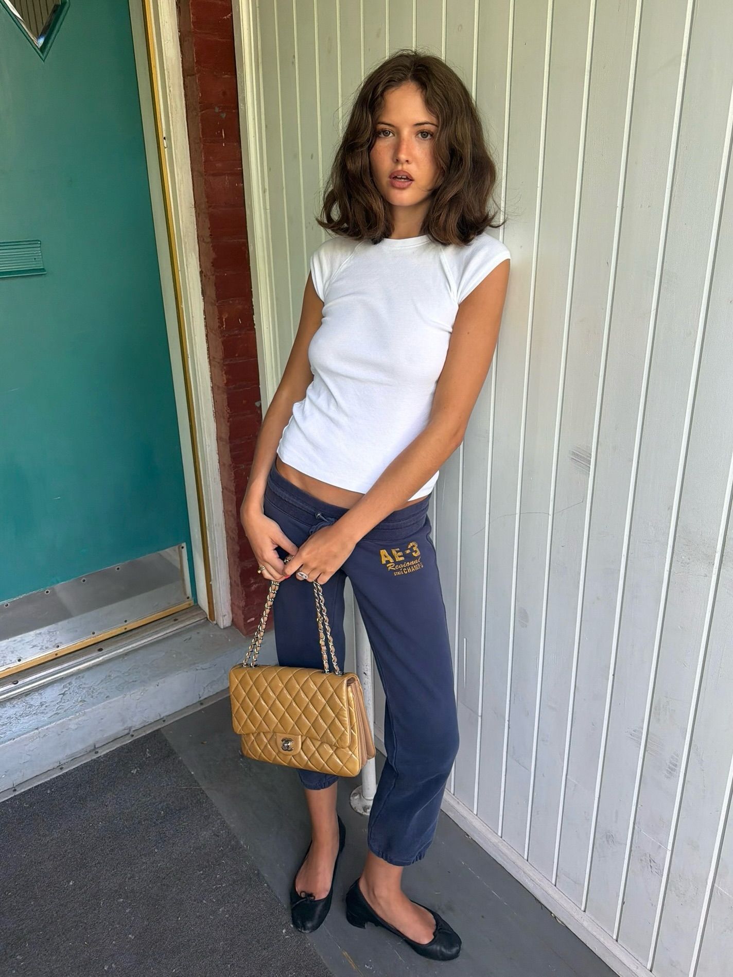 An image of a woman wearing best shoes to wear with capri sweats