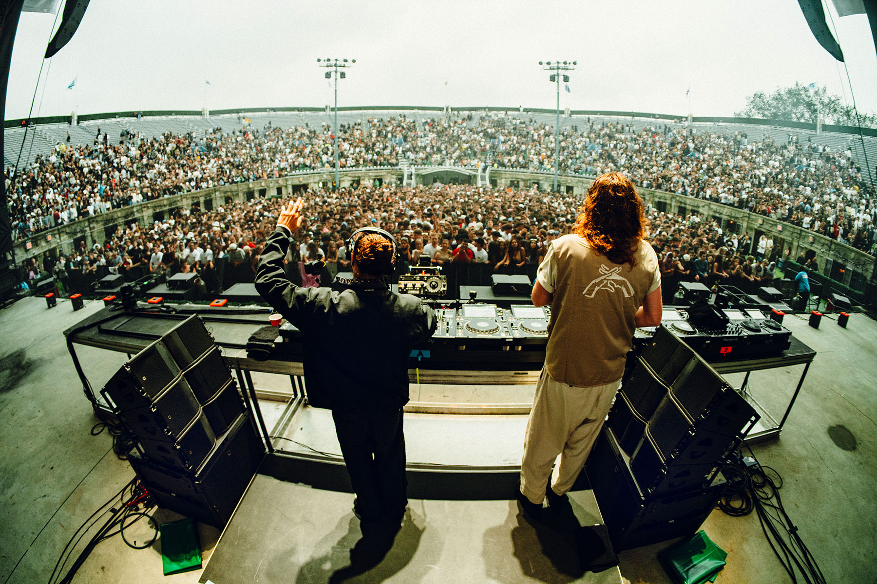 EDM duo JOY (Anonymous) using L-Acoustics “Texas headphones” – three Kara II over a single SB18 per side – as DJ booth monitors.