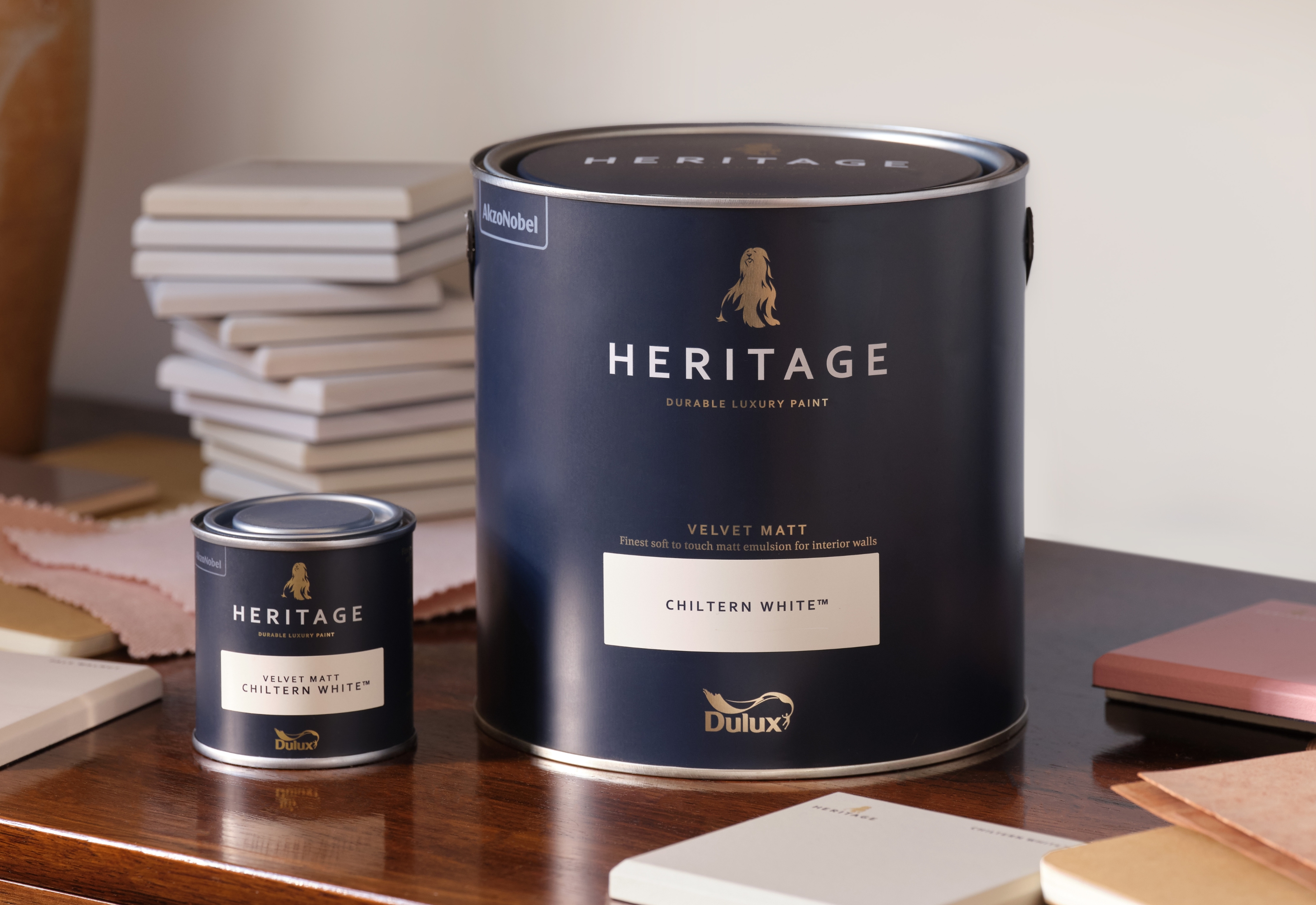 a dulux heritage paint tin and sample tin around samples