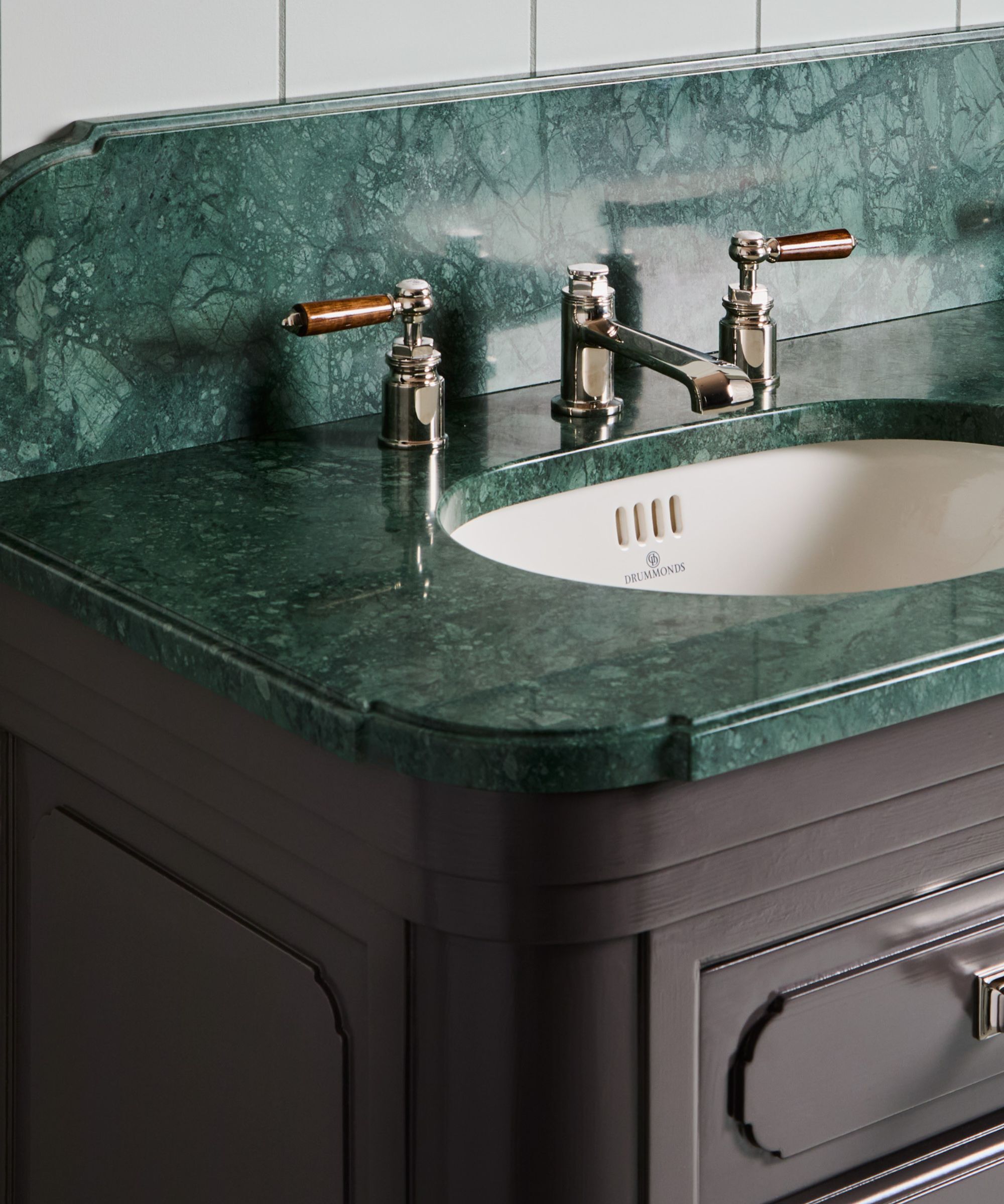 Green marble topped bathroom vanity unit