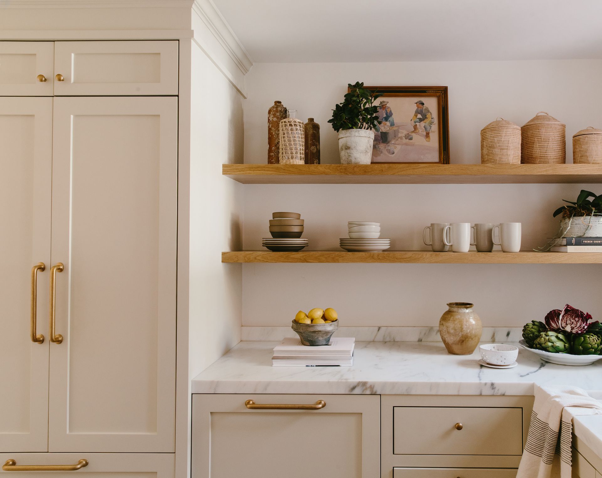Kitchen with neutral cabinets and open shelves