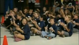 This still from NASA TV shows some of the 400 schoolchildren at Mesa Verde Elementary School in Tucson, Ariz., as they cheer when speaking with Endeavour shuttle astronauts on May 22, 2011 during an event.