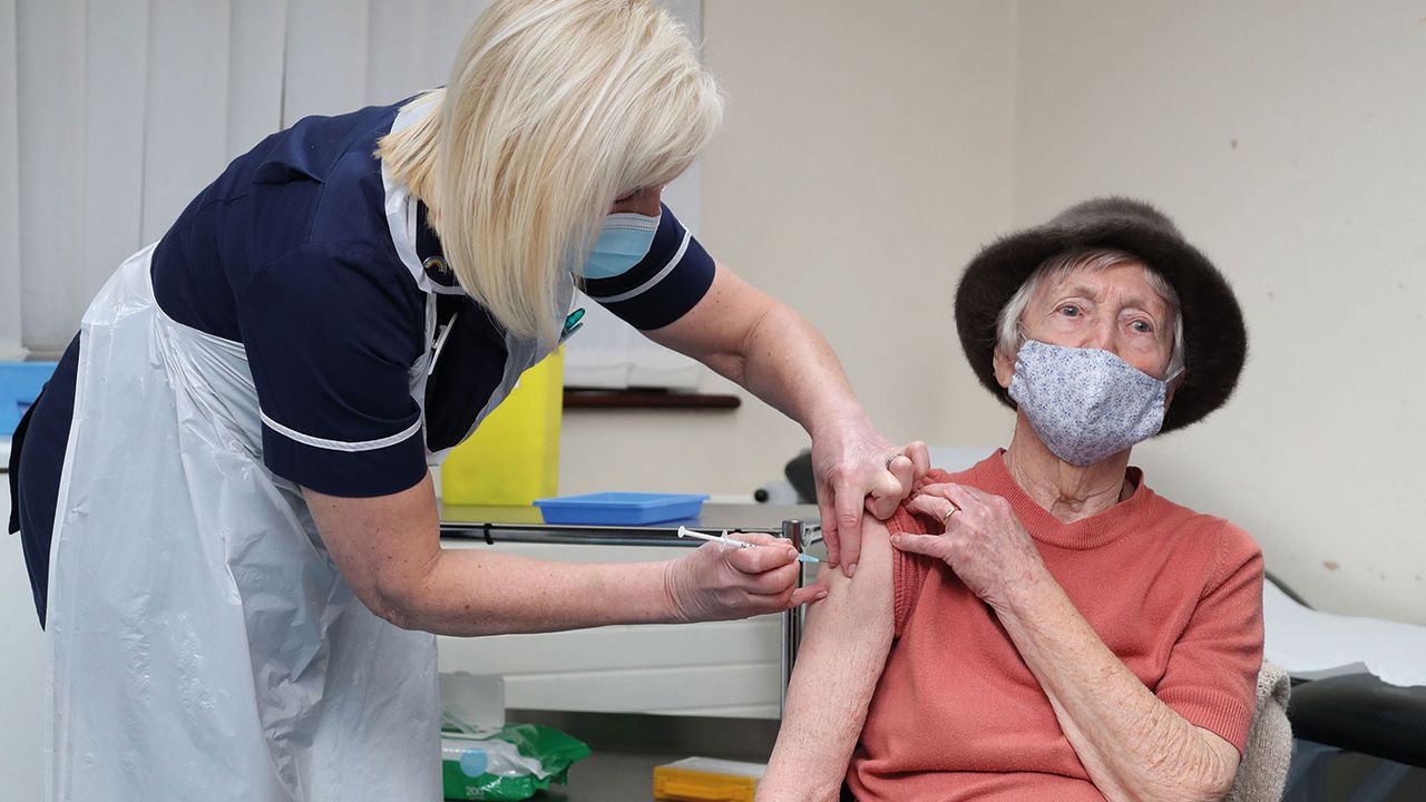 Nurse giving a patient a Covid vaccine