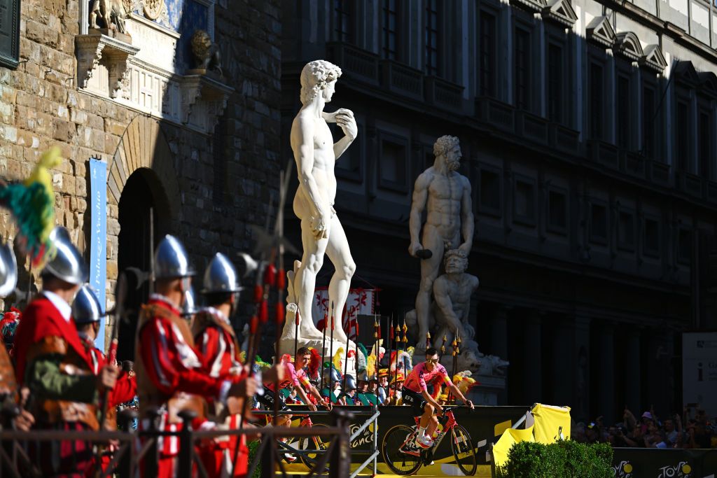 FIRENZE ITALY JUNE 27 Neilson Powless of of The United States and Team EF Education EasyPost with the Michelangelos David statue in the background during the 111th Tour de France 2024 Team Presentation UCIWT on June 27 2024 in Firenze Italy Photo by Dario BelingheriGetty Images
