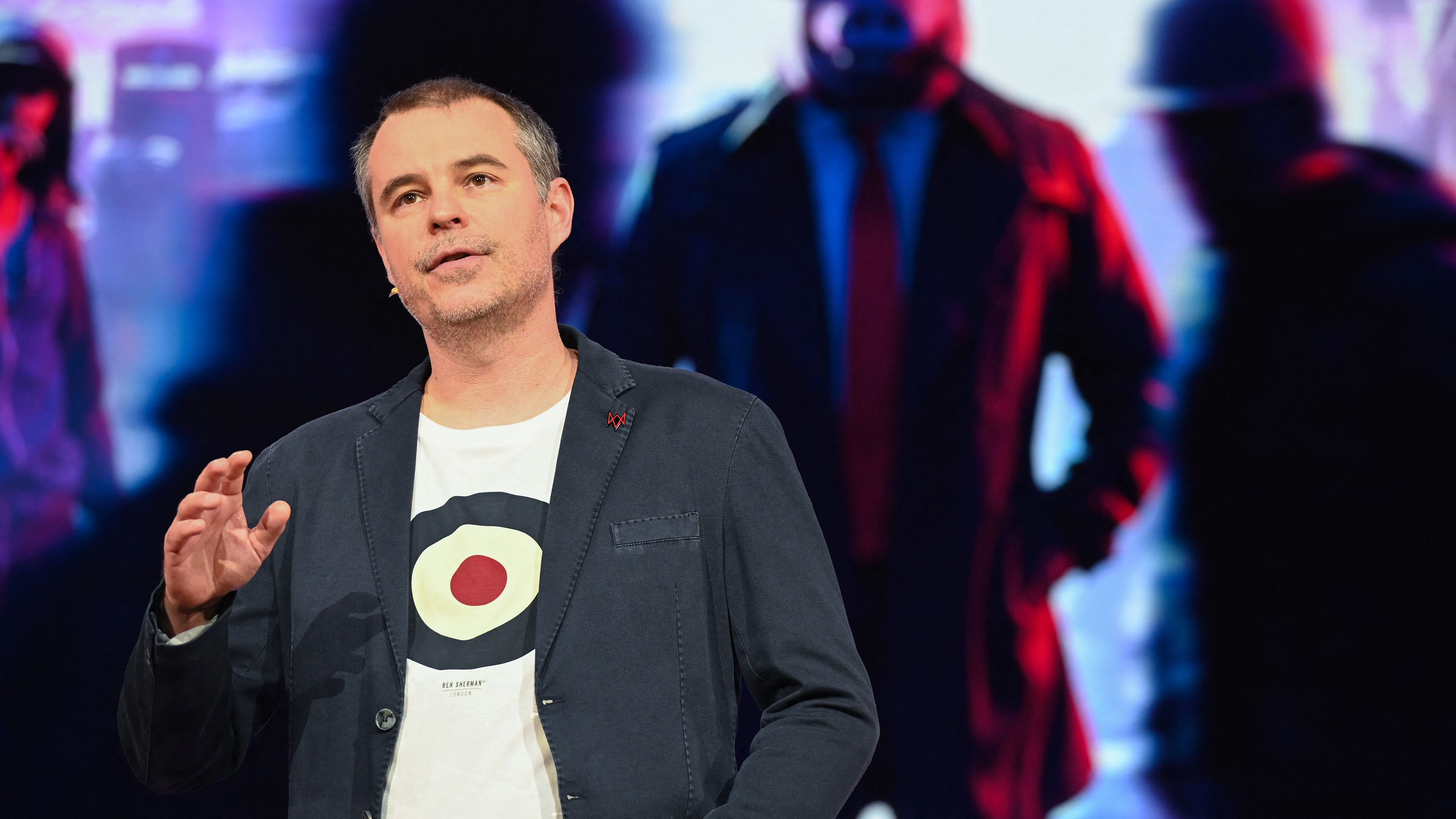 Ubisoft's Clint Hocking introduces "Watch Dogs Legion," at the Ubisoft E3 press conference in Los Angeles, California on June 10, 2019. The new title is set in a post-Brexit dystopian surveillance state. The E3 Electronic Entertainment Expo takes place at the Los Angeles Convention Center June 11-13 (Photo by Robyn Beck / AFP) (Photo by ROBYN BECK/AFP via Getty Images)