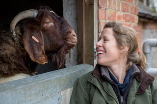 Laura Corbett, goat farmer, Wiltshire. Mrs Corbett is seen here with some of her 100-strong herd of Boer goats, Photograph: Millie Pilkington/Country Life Picture Library OVERS