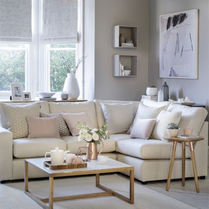 corner sofa in neutral pastel living room