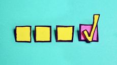 A colorful checklist with three yellow squares and a pink square outlined in black and a yellow checkmark in the pink square.