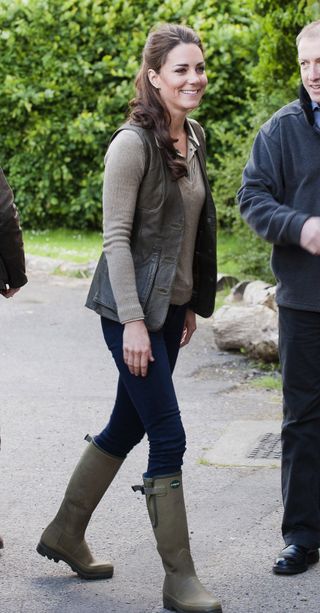 Kate Middleton wearing a gilet and Le Chameau wellington boots, 2012
