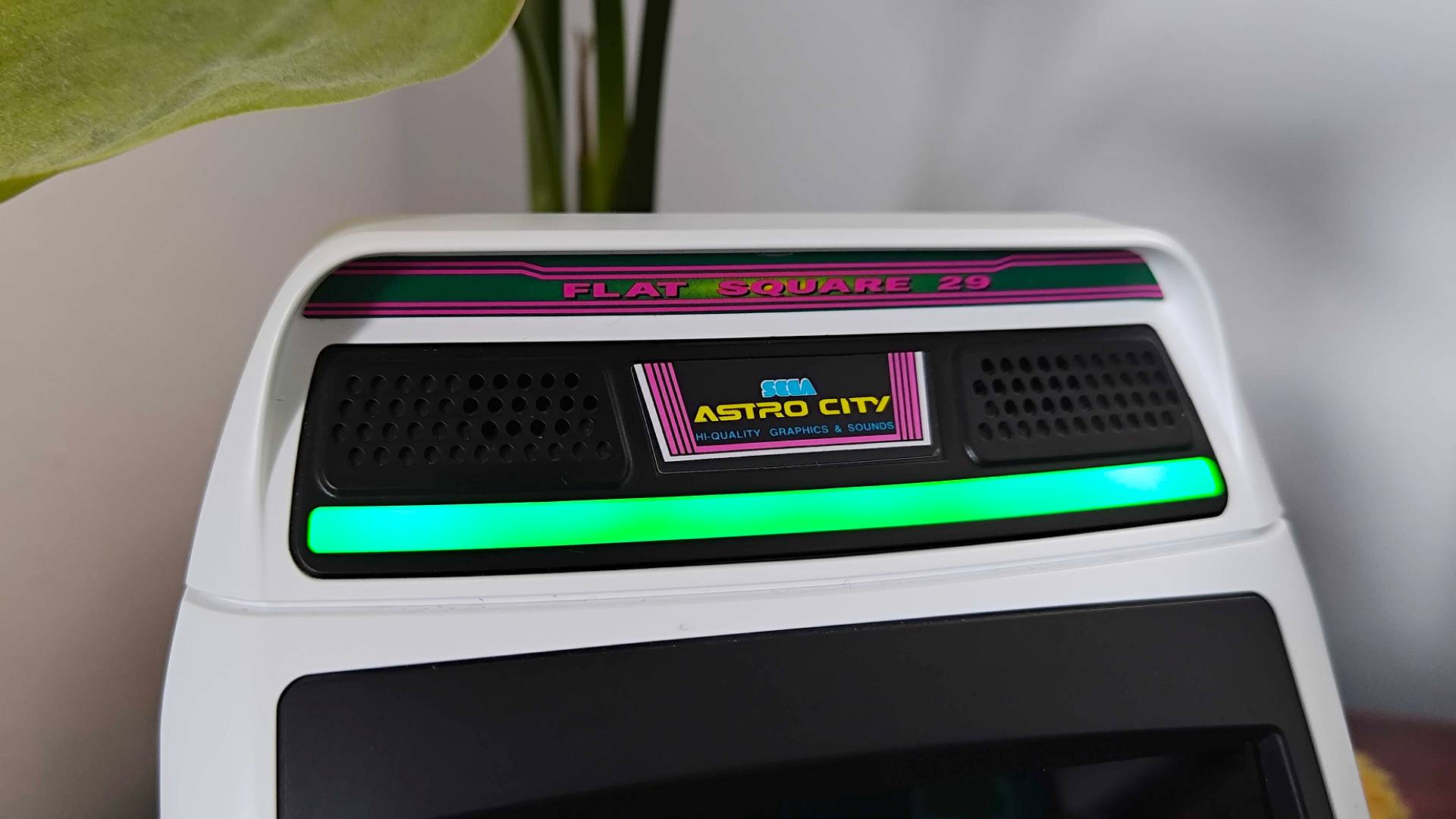 Close up of Sega Astro City Mini top green light bar and decal.