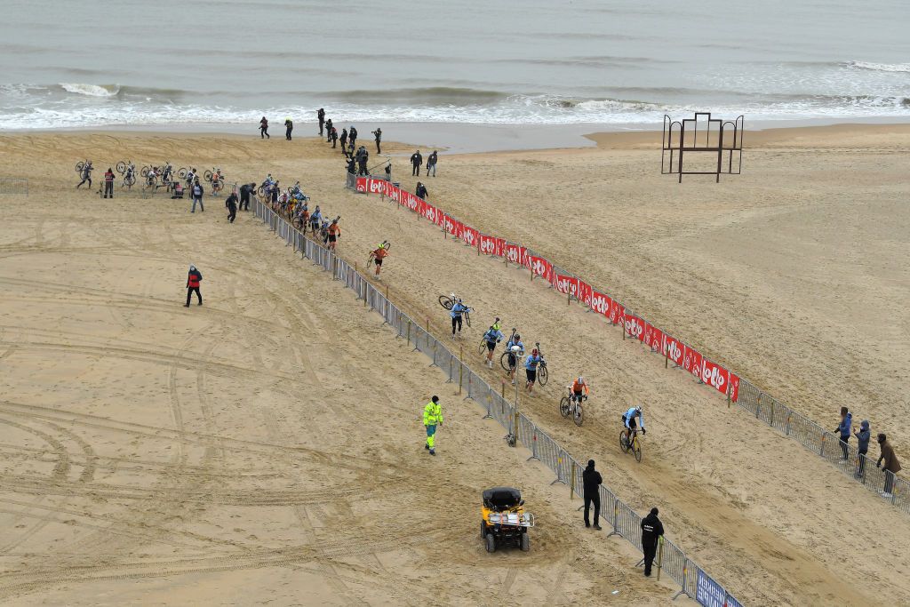 OOSTENDE BELGIUM JANUARY 31 Landscape Peloton Sand Beach Sea during the 72nd UCI CycloCross World Championships Oostende 2021 Men Elite UCICX CXWorldCup Ostend2021 CX on January 31 2021 in Oostende Belgium Photo by Luc ClaessenGetty Images