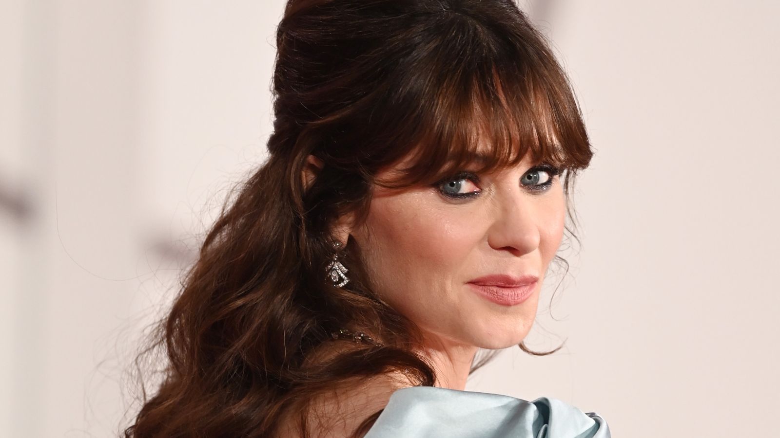 Zooey Deschanel's closet organization is clever and quirky
