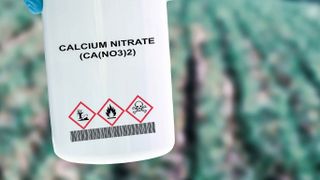 Calcium nitrate in white container