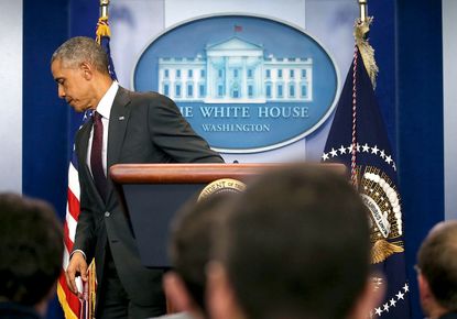 President Obama leaves the podium after his ninth press conference after a mass shooting
