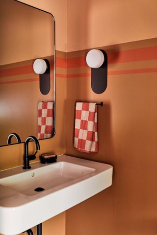 A bright orange bathroom scheme