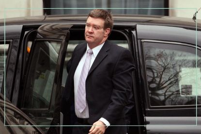 Trevor Rees-Jones in a suit getting out of a taxi