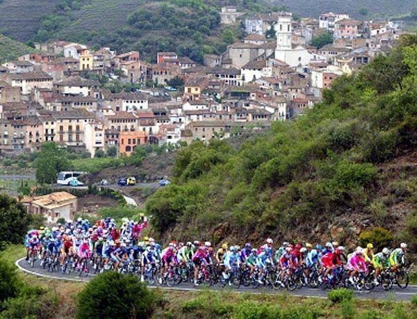 The peloton rides near Montbrio del Camp village along the Cambrils circuit.