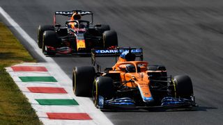 Daniel Ricciardo of Australia driving the (3) McLaren F1 Team MCL35M Mercedes leads Max Verstappen of the Netherlands driving the (33) Red Bull Racing RB16B Honda during the F1 Grand Prix of Italy at Autodromo di Monza on September 12, 2021 in Monza, Italy